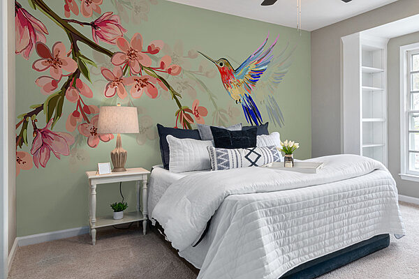 Wall mural Colorful bird flying in the air