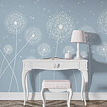 Wall murals White dandelions on a blue background