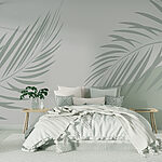 Wall murals Palm leaves on a grey background