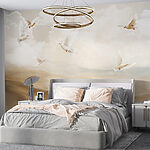 Wall murals Group of white birds flying in the sky