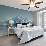 Wall murals Snowy mountain range with a body of water