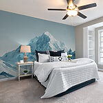 Wall murals Snowy mountain range with blue sky