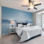 Wall murals Snowy landscape with mountains in the distance