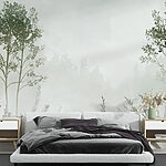 Wall murals Foggy landscape with trees and grass