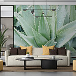 Wall murals Lush green plant with water droplets