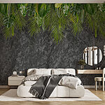 Wall murals Group of green leaves on a grey background