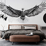 Wall murals Black and white image of a bird flying