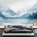Wall murals Lake surrounded by snow and mountains