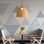 Wall murals White and blue triangles with leaves