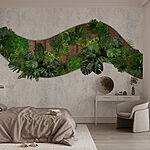 Wall murals Green leaves on a wooden surface