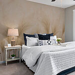 Wall murals Group of feathers on a beige background