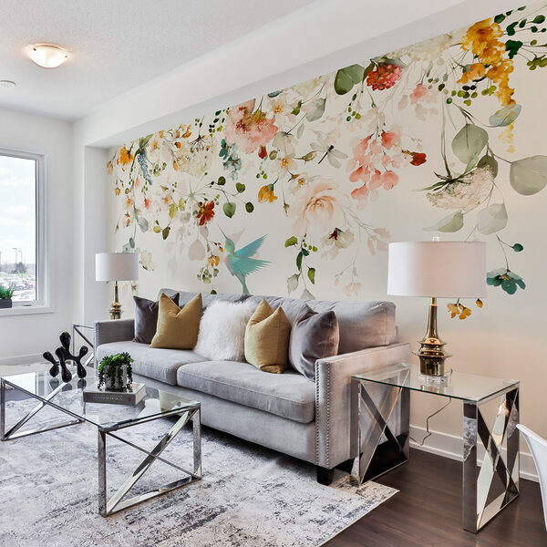 Wall mural Hummingbird hovers beneath floral arch