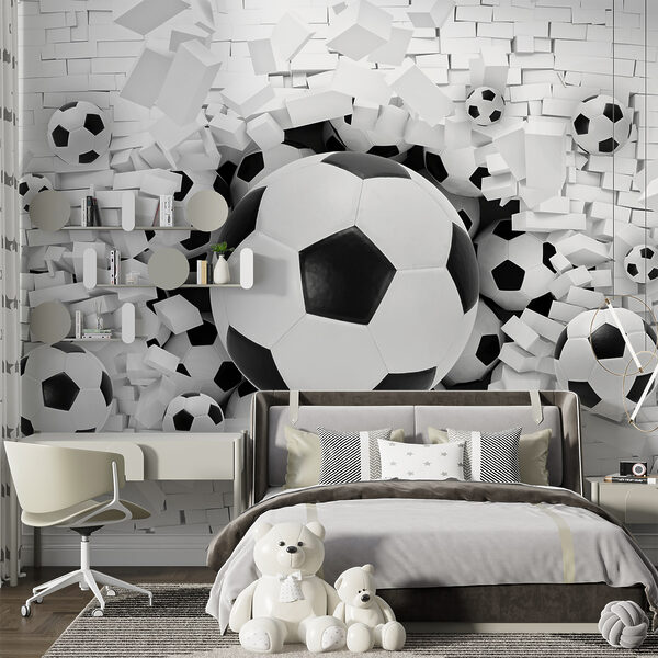 Wall mural Soccer balls burst through the wall