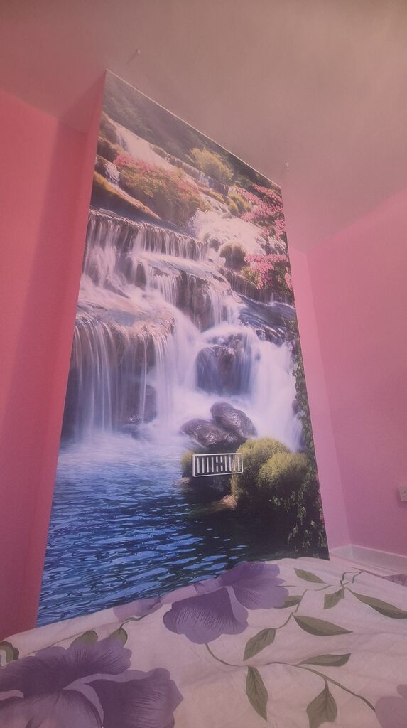 Wall mural Enchanting waterfall amidst vibrant blossoms
