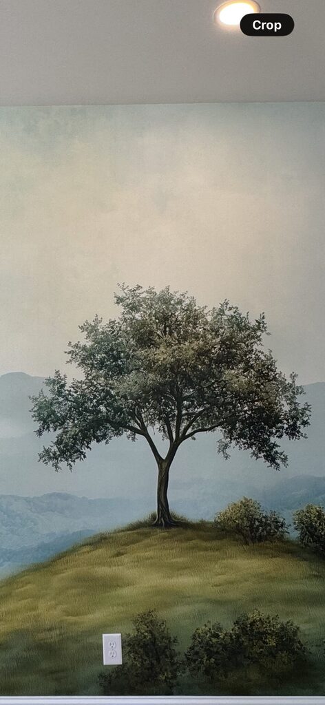 Wall mural Tree on a hill