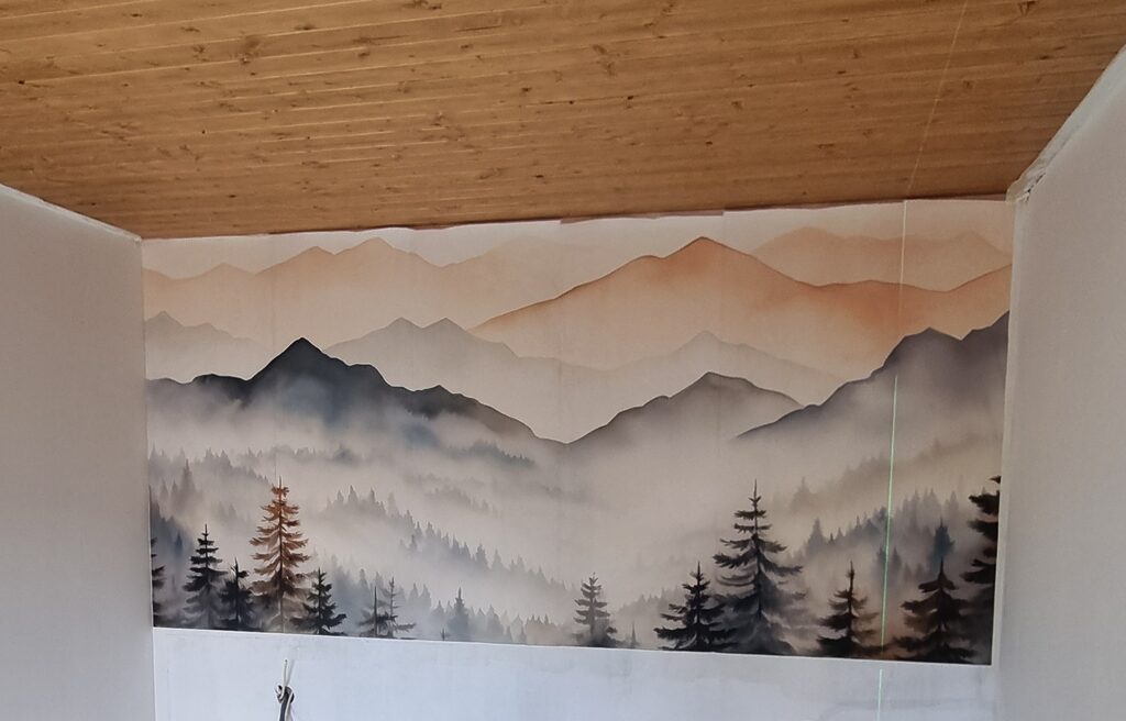 Wall mural Landscape of mountains with trees and fog