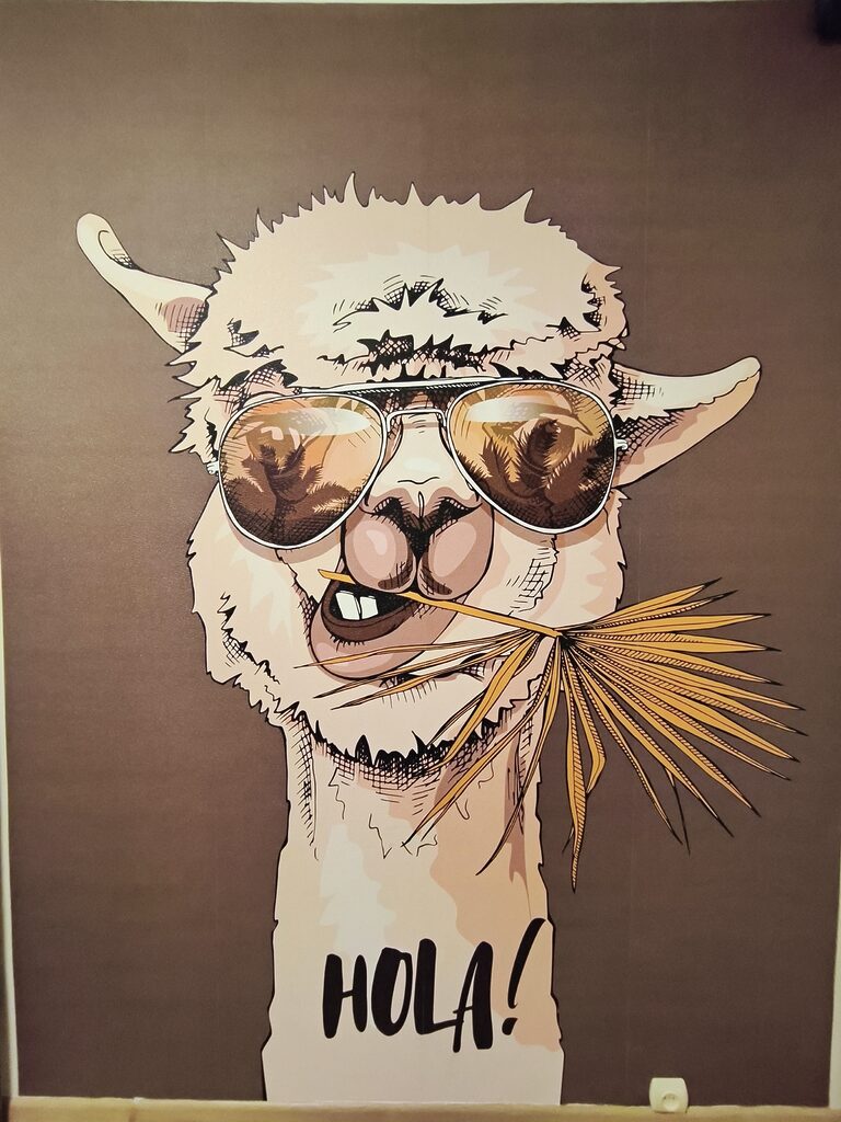 Wall mural Cool llama saying hello stylishly!